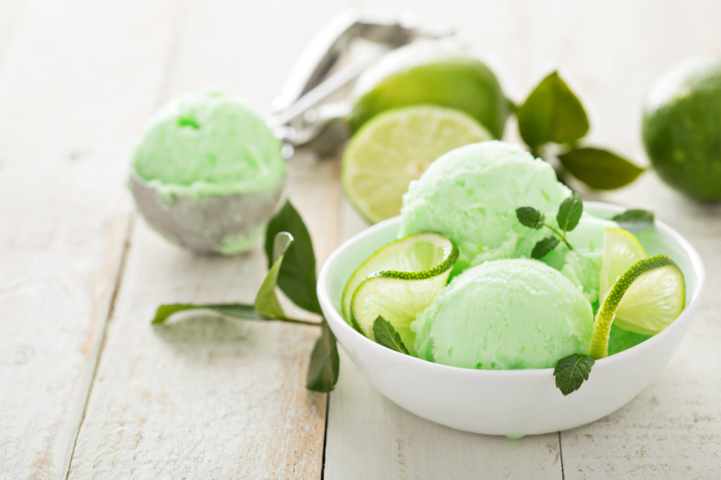 Lime ice cream in a white bowl close up arctic buzz