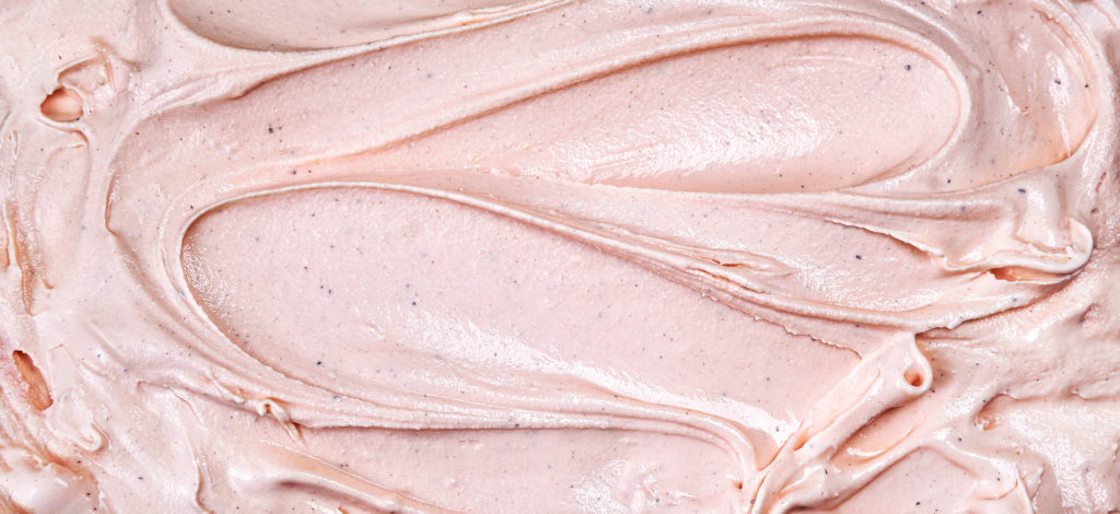 Texture of pink creamy ice cream seeing from above arctic buzz
